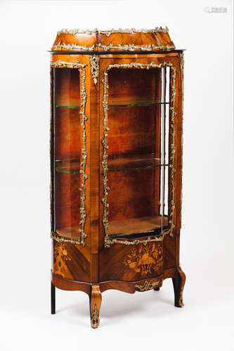 A Louis XVI style display cabinet