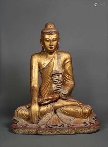 IMPORTANT BOUDDHA EN BOIS SCULPTE DORE