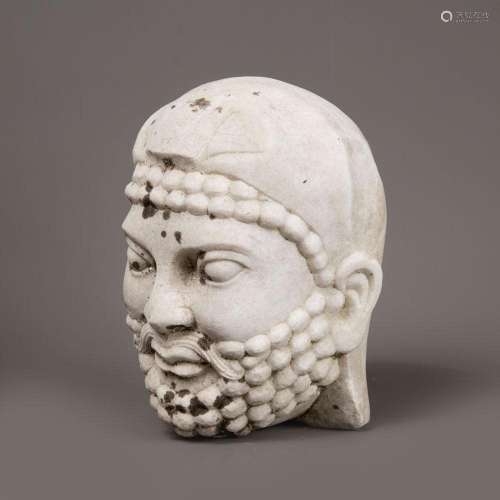 Marble head in archaic style