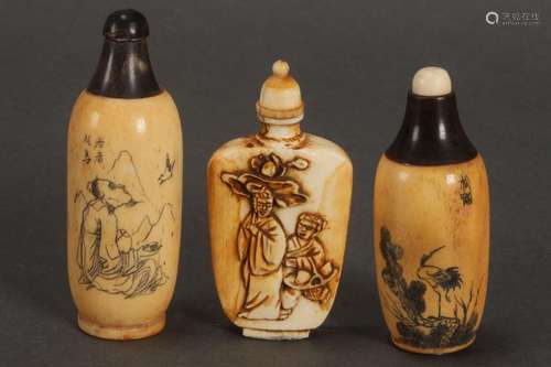 Two Chinese Bone Snuff Bottles and Stoppers,