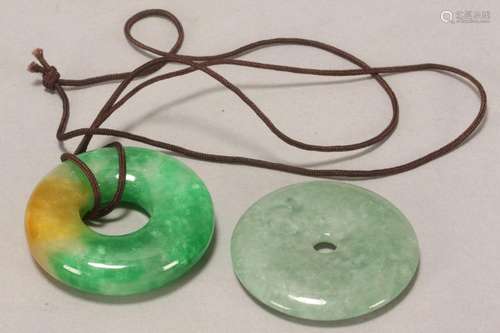 Two Circular Jade Pendants,