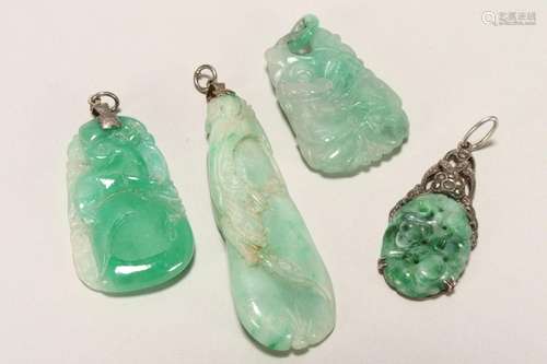 Four Carved Jade Pendants,