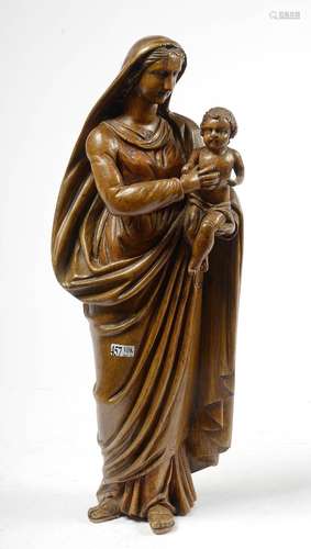 "Vierge à l'Enfant" en noyer sculpté. Epoque:...