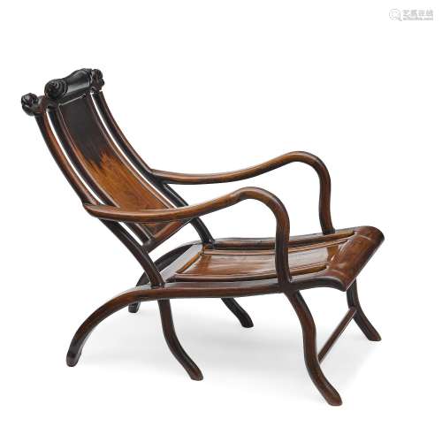 A hardwood reclining chair