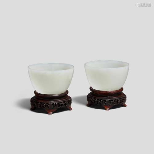 A pair of white jade wine cups