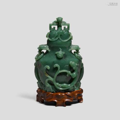 A spinach-green jade 'chilong' baluster vase and cover