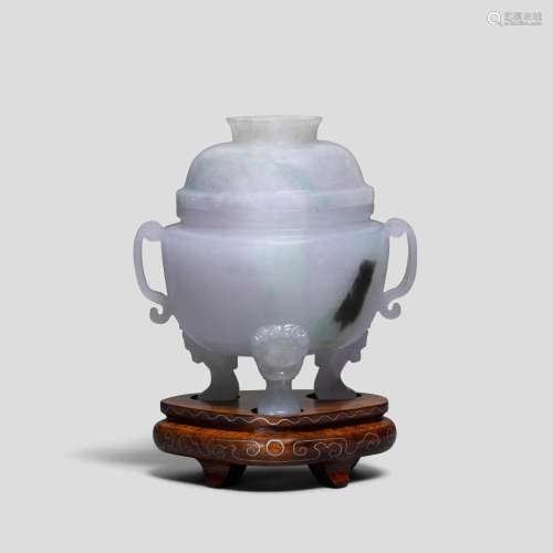 A pale lavender and whitish-green jadeite tripod censer and ...
