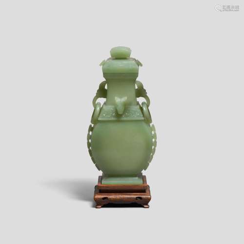 A green jade fanghu-form vase and cover