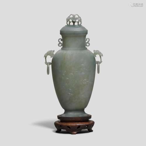 A pale green jade 'Immortals' vase and cover