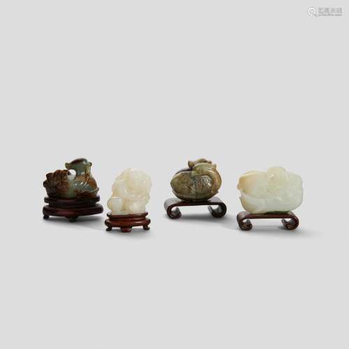 A group of four small jade carvings