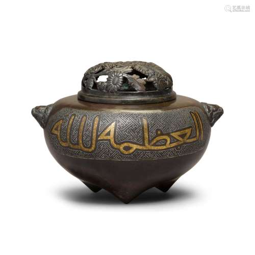 A bronze Arabic-inscribed tripod censer