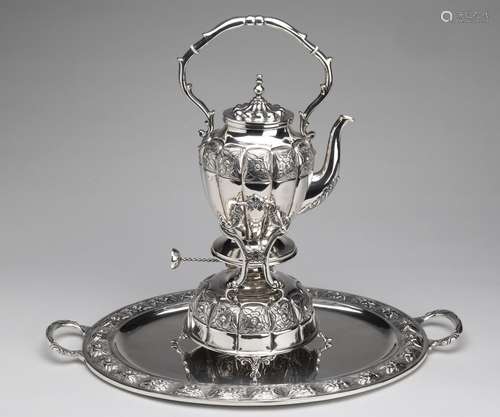 A Mexican silver kettle and burner with matching tray