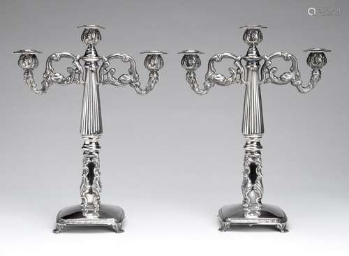 A pair of Spanish silver candelabras