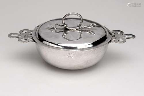 A small silver dish with cover