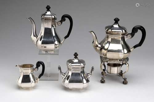 A four piece tea and mocha service with burner