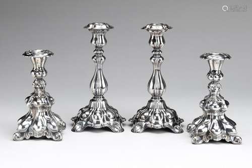 Two pairs of German silver candlesticks