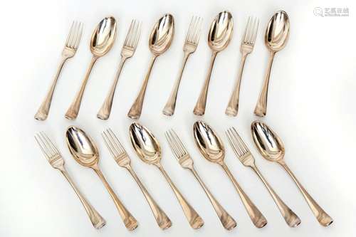 Eight Dutch silver table spoons and eight table forks