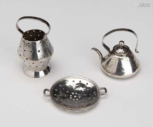 A Dutch silver miniature fish bucket, a colander and a kettl...