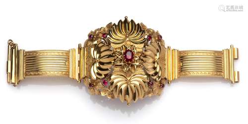 An 18k gold bangle