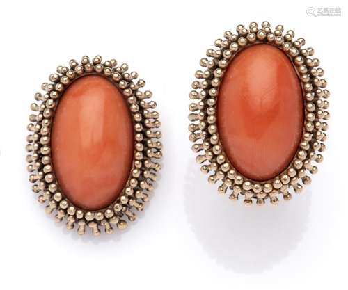 A coral ring and matching pendant