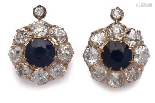 A pair of 14k gold sapphire and diamond earclips