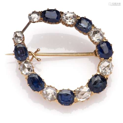 An 18k gold antique sapphire and diamond brooch