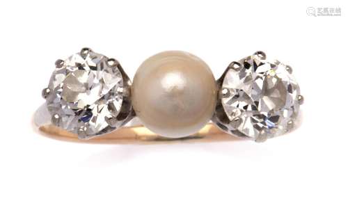 A pearl and diamond ring