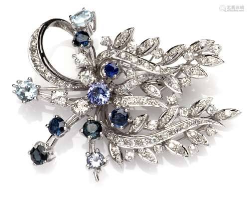 An 18k white gold gem set and diamond brooch