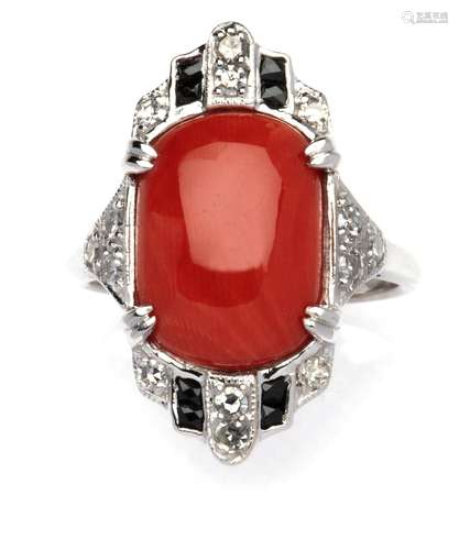 A coral and diamond ring