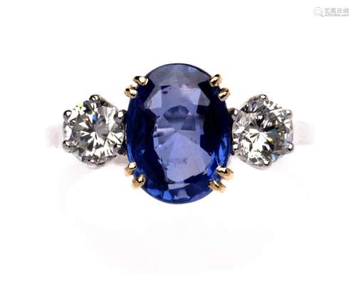 A 14k two-colour gold sapphire and diamond ring