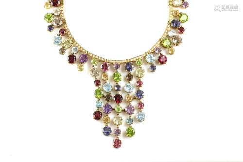 An 18k gold gem set and diamond necklace