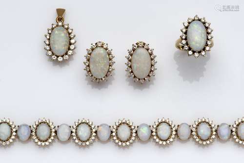 An 18k gold suite of opal and diamond jewellery