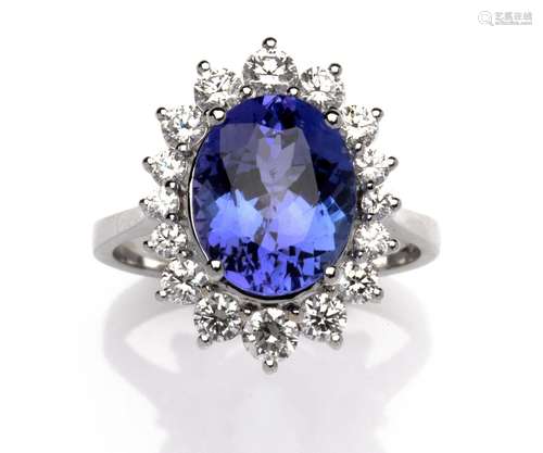 An 18k white gold tanzanite and diamond dress ring