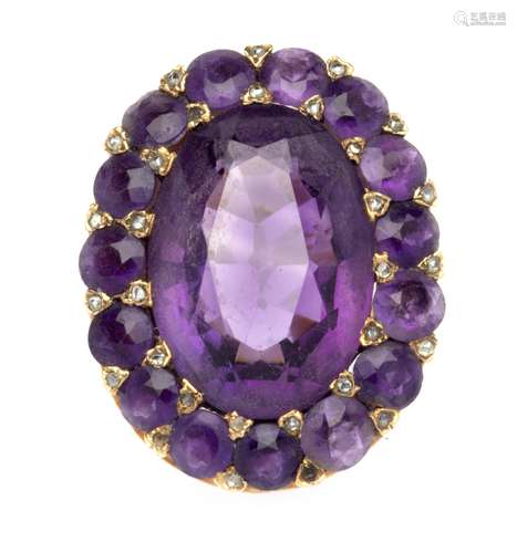 An 18k gold amethyst dress ring