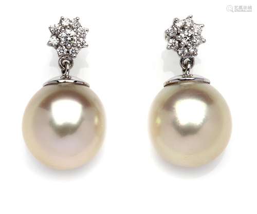 A pair of 18k white gold cultured pearl and diamond earrings