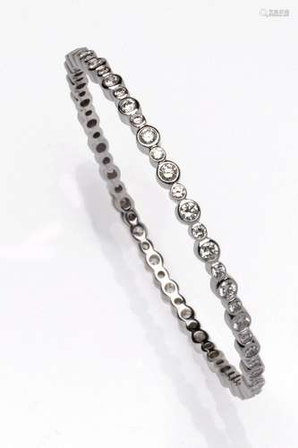 A 14k white gold diamond bangle