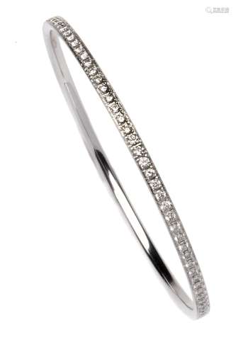 A 14k white gold diamond bangle