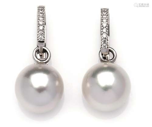 A pair of 18k white gold cultured pearl and diamond earrings