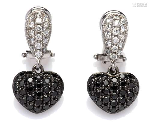 A pair of 18k white gold diamond earclips