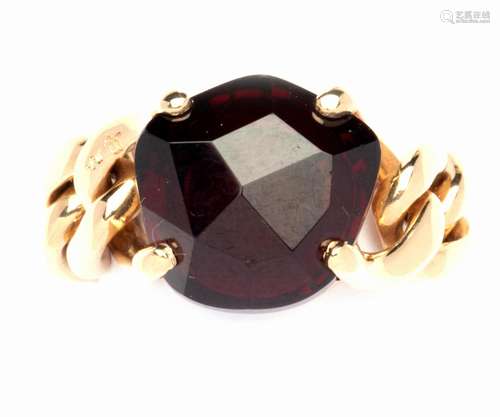 An 18k gold garnet ring, by Pomellato