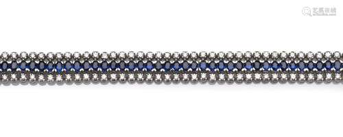 An 18k white gold sapphire and diamond bracelet, by Aris