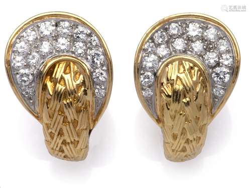 A pair of 14k gold diamond earclips