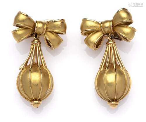 A pair of 18k gold earclips