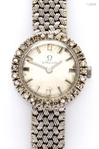 An 18k white gold diamond dress watch, by Omega