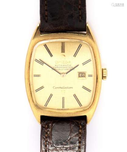 An 18k gold wristwatch with date, by Omega