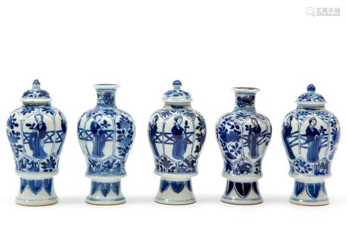 A blue and white miniature garniture set