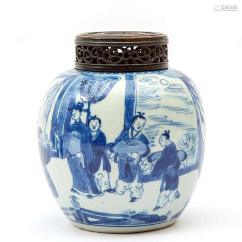 A blue and white vase with figures