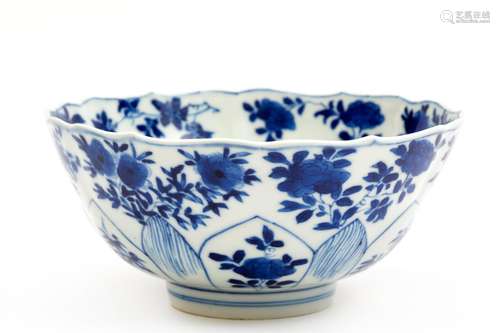 A small blue and white lotus bowl