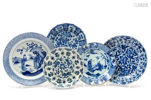 Five various blue and white plates