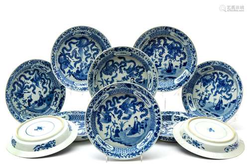 Eleven blue and white deep plates